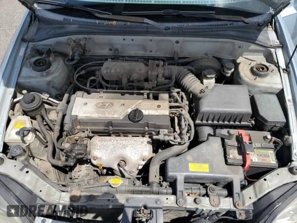 2004 Hyundai Accent GL z VIN KMHCG45C94U574027, wystawiony jako Copart lot #57463905 z przebiegiem 139 595 mil mil oraz Szkoda całkowita • Salvage title. Historia ofert i sprzedaży dostępna na DreamBid. Obrazek 11.