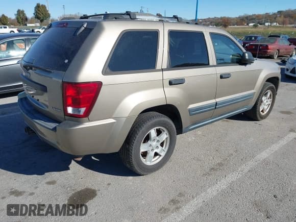 ✅ 2005 Jeep Grand Cherokee Laredo • VIN: 1J4HR48N85C690905 • Lot: 43669656. Listed on IAAI with Not provided. Free auction sales archive from the USA and detailed vehicle history report at DreamBid. Image 4.