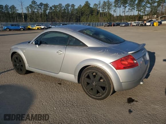 ✅ 2003 Audi TT • VIN: TRUWT28N031003689 • Lot: 46233815. Listed on Copart with 122,607 mi. Free auction sales archive from the USA and detailed vehicle history report at DreamBid. Image 2.