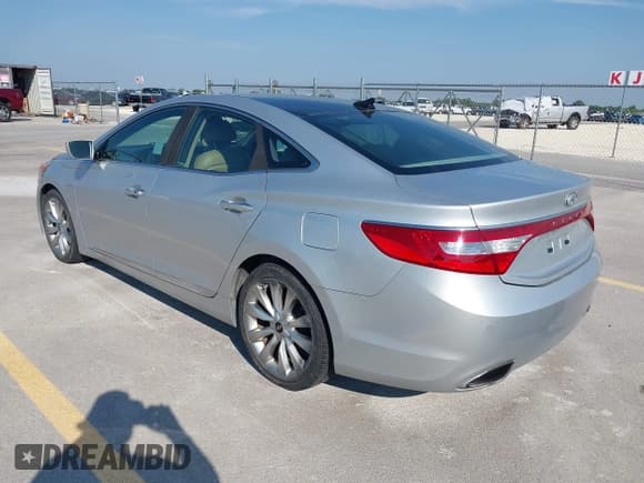 ✅ 2012 Hyundai Azera • VIN: KMHFH4JG6CA176924 • Lot: 43023155. Listed on IAAI with 122,345 mi. Free auction sales archive from the USA and detailed vehicle history report at DreamBid. Image 3.