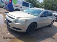 ✅ 2012 Chevrolet Malibu 1LS • VIN: 1G1ZB5E03CF106864 • Lot: 43016130. Listed on IAAI with 284,047 mi. Free auction sales archive from the USA and detailed vehicle history report at DreamBid. Image 2.