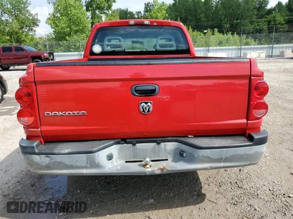 2005 Dodge Dakota ST с VIN 1D7HE28K15S119697, выставлен на аукционе Copart как лот 64600145 с пробегом 124 491 миль миль и Списание • Salvage title. История ставок и продаж доступна на DreamBid. Изображение 6.