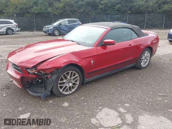 ✅ 2012 Ford Mustang Premium • VIN: 1ZVBP8EM5C5273857 • Lot: 43460330. Listed on IAAI with 106,751 mi. Free auction sales archive from the USA and detailed vehicle history report at DreamBid. Image 2.