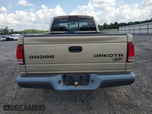 2004 Dodge Dakota z VIN 1D7GL12K04S719730, wystawiony jako Copart lot #64060545 z przebiegiem 140 165 mil mil oraz Czysty tytuł • Clean title. Historia ofert i sprzedaży dostępna na DreamBid. Obrazek 6.