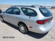 ✅ 1999 Ford Taurus SE • VIN: 1FAFP58S8XA118834 • Лот: 42593532. Опубликован ранее на IAAI с пробегом 141 242 миль. Бесплатный доступ к архиву аукционных продаж из США и подробный отчёт об истории автомобиля на DreamBid. Изображение 3.