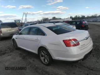 ✅ 2012 Ford Taurus SEL • VIN: 1FAHP2EW9CG138287 • Lot: 43539374. Listed on IAAI with 196,885 mi. Free auction sales archive from the USA and detailed vehicle history report at DreamBid. Image 3.