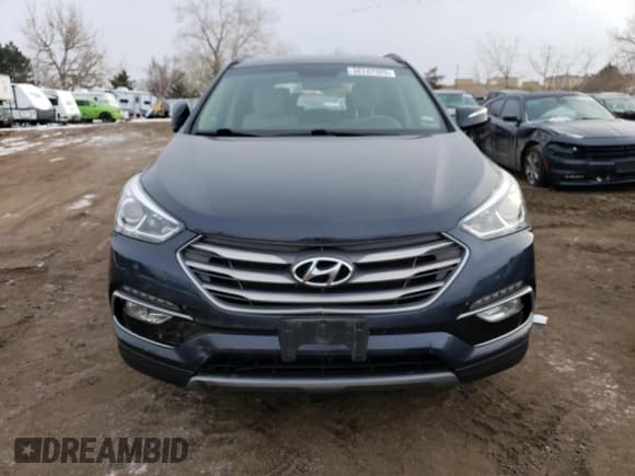 ✅ 2018 Hyundai Santa Fe 2.4L • VIN: 5NMZUDLB3JH055091 • Лот: 49159594. Опубликован ранее на Copart с пробегом 57 112 миль. Бесплатный доступ к архиву аукционных продаж из США и подробный отчёт об истории автомобиля на DreamBid. Изображение 5.
