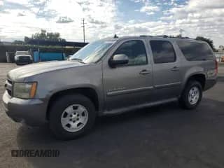 2009 Chevrolet Suburban 2LT z VIN 1GNFK26329R168062, wystawiony jako Copart lot #83852485 z przebiegiem 194 226 mil mil oraz Czysty tytuł • Clean title. Historia ofert i sprzedaży dostępna na DreamBid. Obrazek 1.
