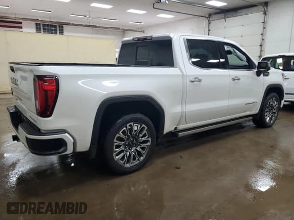 ✅ 2023 GMC Sierra 1500 Denali Ultimate • VIN: 1GTUUHELXPZ237477 • Лот: 67481445. Опубликован ранее на Copart с пробегом 48 127 миль. Бесплатный доступ к архиву аукционных продаж из США и подробный отчёт об истории автомобиля на DreamBid. Изображение 3.