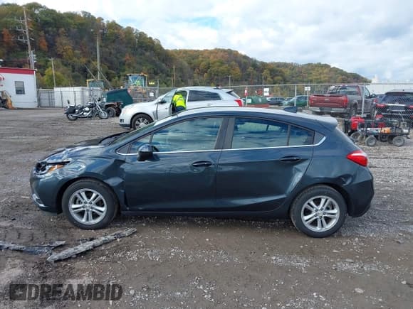 ✅ 2017 Chevrolet Cruze LT • VIN: 3G1BE6SM4HS516419 • Lot: 43594135. Listed on IAAI with 54,908 mi. Free auction sales archive from the USA and detailed vehicle history report at DreamBid. Image 14.
