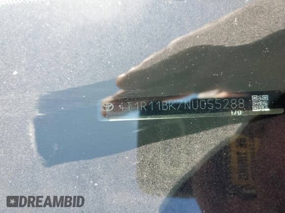 2022 Toyota Camry LE с VIN 4T1R11BK7NU055288, выставлен на аукционе Copart как лот 67012075 с пробегом 106 728 миль миль и Списание • Salvage title. История ставок и продаж доступна на DreamBid. Изображение 12.