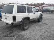 ✅ 2001 Jeep Cherokee Sport • VIN: 1J4FF48S11L583100 • Lot: 43576007. Listed on IAAI with 183,638 mi. Free auction sales archive from the USA and detailed vehicle history report at DreamBid. Image 4.
