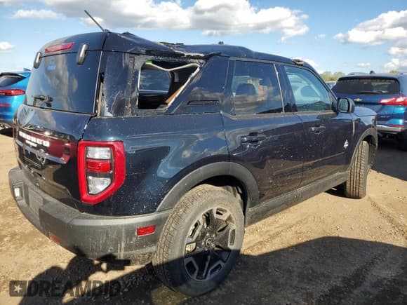 ✅ 2023 Ford Bronco Sport Outer Banks • VIN: 3FMCR9C65PRE22780 • Лот: 85850005. Опубликован ранее на Copart с пробегом 29 060 миль. Бесплатный доступ к архиву аукционных продаж из США и подробный отчёт об истории автомобиля на DreamBid. Изображение 3.