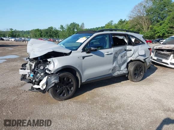 2022 Kia Sorento X-Line S z VIN 5XYRLDLC7NG144870, wystawiony jako IAAI lot #42557861 z przebiegiem 41 812 mil mil oraz . Historia ofert i sprzedaży dostępna na DreamBid. Obrazek 2.