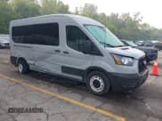 ✅ 2023 Ford Transit Passenger XL • VIN: 1FBAX2C85PKB42666 • Lot: 42424233. Listed on IAAI with 13,835 mi. Free auction sales archive from the USA and detailed vehicle history report at DreamBid. Image 1.