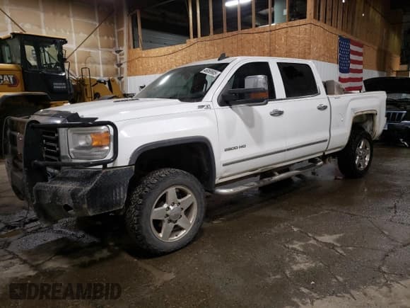 ✅ 2015 GMC Sierra 2500HD SLT • VIN: 1GT12ZE80FF600704 • Lot: 46069905. Listed on Copart with 256,330 mi. Free auction sales archive from the USA and detailed vehicle history report at DreamBid. Image 1.