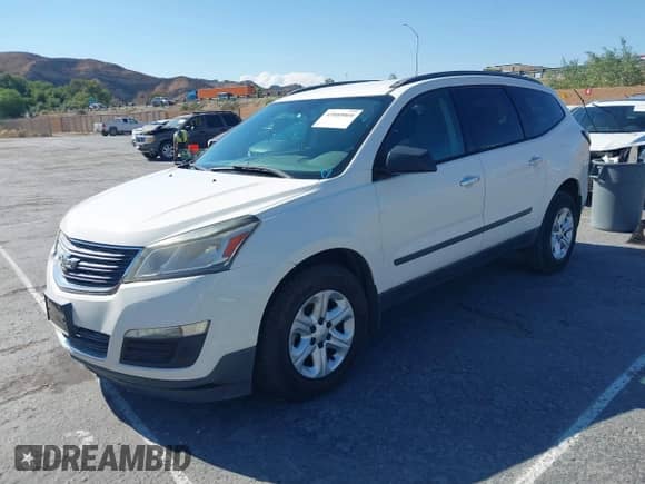 2013 Chevrolet Traverse LS with VIN 1GNKRFED5DJ184307, listed as a IAAI auction lot 43089060 with 106,499 mi miles and . Bid and sale history available at DreamBid. Image 2.