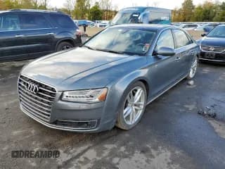 ✅ 2015 Audi A8 4.0T • VIN: WAU32AFD6FN013061 • Лот: 73105133. Опубликован ранее на Copart с пробегом Не указан. Бесплатный доступ к архиву аукционных продаж из США и подробный отчёт об истории автомобиля на DreamBid. Изображение 1.