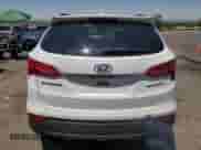 2014 Hyundai Santa Fe z VIN 5XYZW3LA2EG170485, wystawiony jako Copart lot #64200015 z przebiegiem 152 769 mil mil oraz Szkoda całkowita • Salvage title. Historia ofert i sprzedaży dostępna na DreamBid. Obrazek 6.
