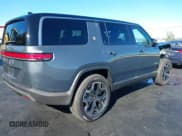 ✅ 2026 Rivian R1S Adventure • VIN: 7PDSGCBA8TN075797 • Lot: 43548257. Wystawiony na IAAI z przebiegiem 719 mil. Bezpłatny archiwum sprzedaży aukcyjnych z USA i szczegółowy raport historii pojazdu na DreamBid. Zdjęcie 4.