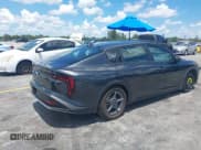 ✅ 2025 Kia K4 LXS • VIN: 3KPFT4DE1SE021125 • Lot: 43012476. Listed on IAAI with 16,563 mi. Free auction sales archive from the USA and detailed vehicle history report at DreamBid. Image 4.