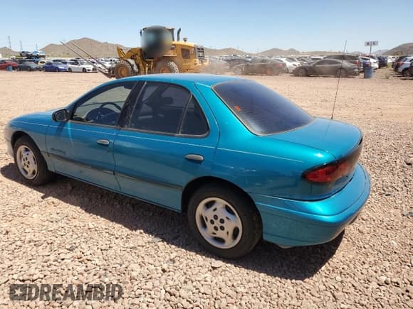 ✅ 1997 Pontiac Sunfire SE • VIN: 1G2JB5249V7533933 • Lot: 82262724. Wystawiony na Copart z przebiegiem 86 637 mil. Bezpłatny archiwum sprzedaży aukcyjnych z USA i szczegółowy raport historii pojazdu na DreamBid. Zdjęcie 2.