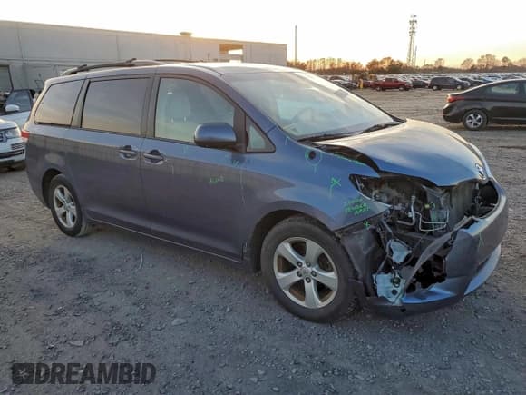 ✅ 2014 Toyota Sienna LE • VIN: 5TDKK3DC0ES411900 • Lot: 94628925. Listed on Copart with 219,271 mi. Free auction sales archive from the USA and detailed vehicle history report at DreamBid. Image 4.