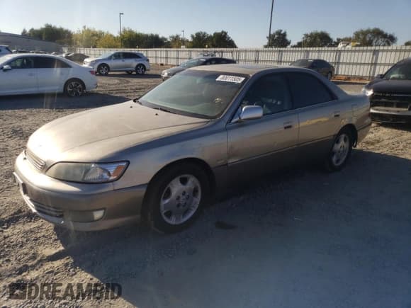 ✅ 2000 Lexus ES 300 • VIN: JT8BF28G7Y0285813 • Lot: 80011505. Listed on Copart with 143,055 mi. Free auction sales archive from the USA and detailed vehicle history report at DreamBid. Image 1.
