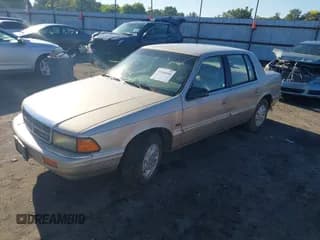 ✅ 1992 Dodge Spirit • VIN: 3B3XA4638NT238159 • Lot: 43300458. Listed on IAAI with 158,922 mi. Free auction sales archive from the USA and detailed vehicle history report at DreamBid. Image 2.