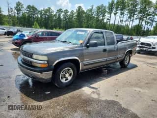 1999 Chevrolet Silverado 1500 LS with VIN 2GCEC19V2X1226878, listed as a Copart auction lot 65710955 with 490,421 mi miles and Salvage title. Bid and sale history available at DreamBid. Image 1.