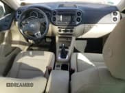 ✅ 2013 Volkswagen Tiguan SE • VIN: WVGAV7AX7DW018388 • Lot: 56188045. Wystawiony na Copart z przebiegiem 98 066 mil. Bezpłatny archiwum sprzedaży aukcyjnych z USA i szczegółowy raport historii pojazdu na DreamBid. Zdjęcie 8.