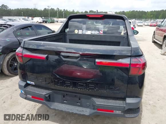 2022 Hyundai Santa Cruz SE with VIN 5NTJA4AE6NH003287, listed as a IAAI auction lot 41957238 with 39,113 mi miles and . Bid and sale history available at DreamBid. Image 16.