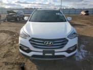 ✅ 2017 Hyundai Santa Fe 2.4L • VIN: 5NMZUDLB5HH035516 • Lot: 92186305. Listed on Copart with 158,230 mi. Free auction sales archive from the USA and detailed vehicle history report at DreamBid. Image 5.