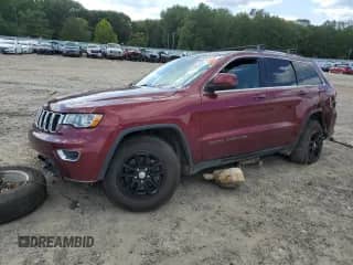 2018 Jeep Grand Cherokee Laredo E with VIN 1C4RJEAG7JC359164, listed as a Copart auction lot 69985915 with 125,918 mi miles and Salvage title. Bid and sale history available at DreamBid. Image 1.