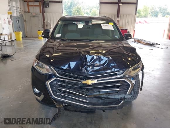 ✅ 2020 Chevrolet Traverse LT Cloth • VIN: 1GNEVGKW2LJ133978 • Lot: 42891196. Listed on IAAI with 99,472 mi. Free auction sales archive from the USA and detailed vehicle history report at DreamBid. Image 13.