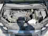 2013 Chevrolet Sonic RS z VIN 1G1JG6SB4D4141677, wystawiony jako Copart lot #63330805 z przebiegiem 119 896 mil mil oraz Szkoda całkowita • Salvage title. Historia ofert i sprzedaży dostępna na DreamBid. Obrazek 11.