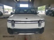 ✅ 2023 Rivian R1S Adventure • VIN: 7PDSGABAXPN021962 • Lot: 66184454. Wystawiony na Copart z przebiegiem Nie podano. Bezpłatny archiwum sprzedaży aukcyjnych z USA i szczegółowy raport historii pojazdu na DreamBid. Zdjęcie 5.