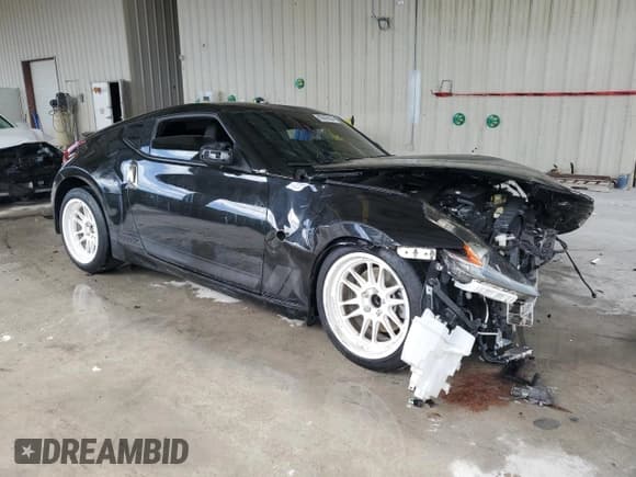 ✅ 2019 Nissan 370Z • VIN: JN1AZ4EH1KM421739 • Лот: 80845634. Опубликован ранее на Copart с пробегом 87 755 миль. Бесплатный доступ к архиву аукционных продаж из США и подробный отчёт об истории автомобиля на DreamBid. Изображение 4.