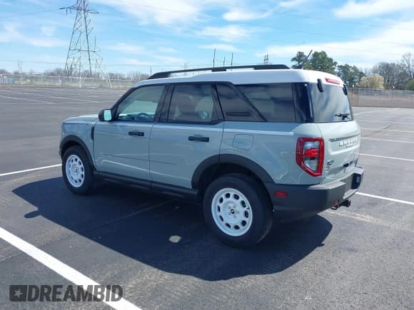 ✅ 2023 Ford Bronco Sport Heritage • VIN: 3FMCR9G69PRE19603 • Lot: 41810899. Listed on IAAI with 5,185 mi. Free auction sales archive from the USA and detailed vehicle history report at DreamBid. Image 3.