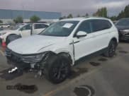 ✅ 2022 Volkswagen Tiguan SE • VIN: 3VV3B7AX2NM020185 • Lot: 42956464. Listed on IAAI with 31,023 mi. Free auction sales archive from the USA and detailed vehicle history report at DreamBid. Image 2.