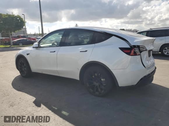 ✅ 2021 Tesla Model Y Standard Range • VIN: 5YJYGDEDXMF103452 • Lot: 82534615. Listed on Copart with 56,910 mi. Free auction sales archive from the USA and detailed vehicle history report at DreamBid. Image 2.