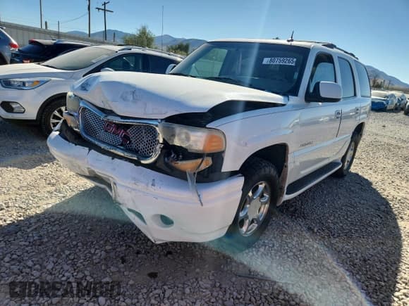 ✅ 2002 GMC Yukon Denali • VIN: 1GKEK63U02J293997 • Lot: 80759265. Listed on Copart with 181,524 mi. Free auction sales archive from the USA and detailed vehicle history report at DreamBid. Image 1.