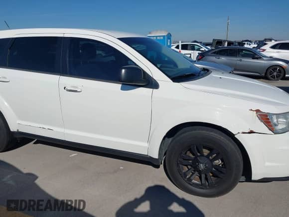 2015 Dodge Journey American Value z VIN 3C4PDCAB0FT540285, wystawiony jako IAAI lot #43610721 z przebiegiem 208 916 mil mil oraz . Historia ofert i sprzedaży dostępna na DreamBid. Obrazek 6.