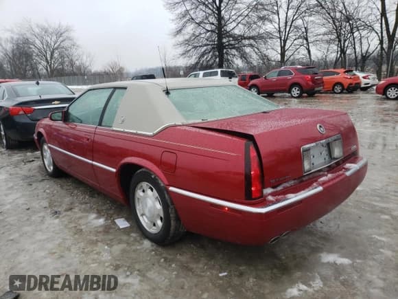 ✅ 2001 Cadillac Eldorado ESC • VIN: 1G6EL12Y61B107519 • Lot: 38051744. Listed on Copart with 52,018 mi. Free auction sales archive from the USA and detailed vehicle history report at DreamBid. Image 2.