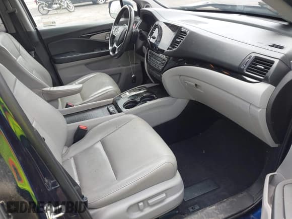 ✅ 2019 Honda Pilot Touring 7-Passenger • VIN: 5FNYF6H68KB001978 • Lot: 42091795. Listed on IAAI with 129,145 mi. Free auction sales archive from the USA and detailed vehicle history report at DreamBid. Image 5.