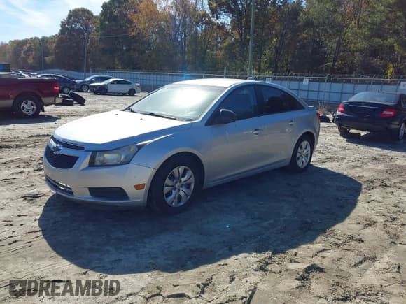 ✅ 2013 Chevrolet Cruze LS • VIN: 1G1PA5SH0D7259573 • Lot: 43613680. Listed on IAAI with 146,199 mi. Free auction sales archive from the USA and detailed vehicle history report at DreamBid. Image 2.