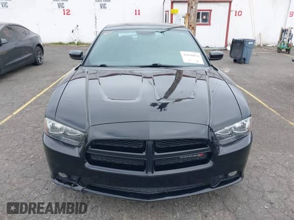 2012 Dodge Charger SXT z VIN 2C3CDXHG6CH248267, wystawiony jako IAAI lot #42836834 z przebiegiem 130 898 mil mil oraz . Historia ofert i sprzedaży dostępna na DreamBid. Obrazek 13.