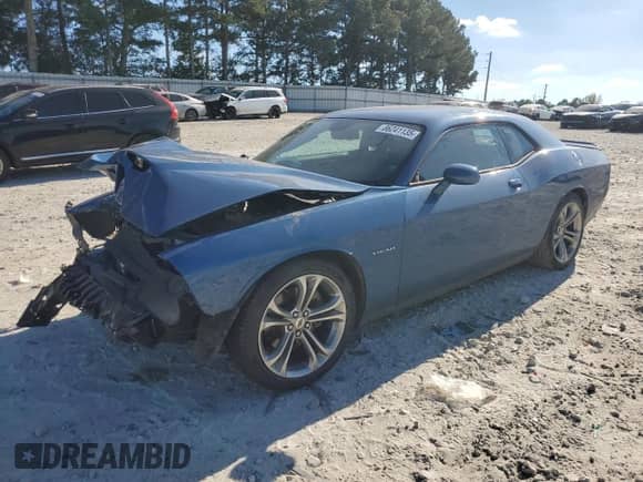 2021 Dodge Challenger R/T with VIN 2C3CDZBT4MH571347, listed as a Copart auction lot 86241135 with 76,060 mi miles and Salvage title. Bid and sale history available at DreamBid. Image 1.