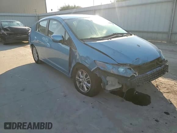 ✅ 2010 Honda Insight EX • VIN: JHMZE2H70AS013132 • Lot: 82199695. Listed on Copart with 388,698 mi. Free auction sales archive from the USA and detailed vehicle history report at DreamBid. Image 14.