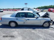 ✅ 2003 Ford Police Interceptor Street Appear • VIN: 2FAFP71W93X101292 • Lot: 40263949. Listed on IAAI with 255,111 mi. Free auction sales archive from the USA and detailed vehicle history report at DreamBid. Image 12.